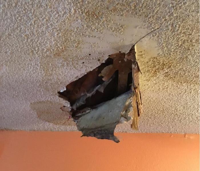Water damage from leak in Dallas before drying and restoration