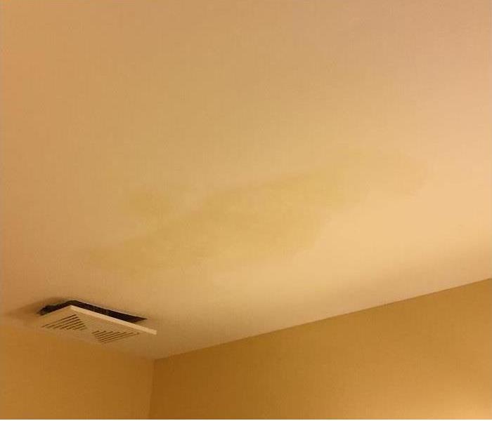 Water Stained ceiling before restoration and drying in Dallas