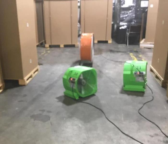 Flooded commercial warehouse after drying and water removal