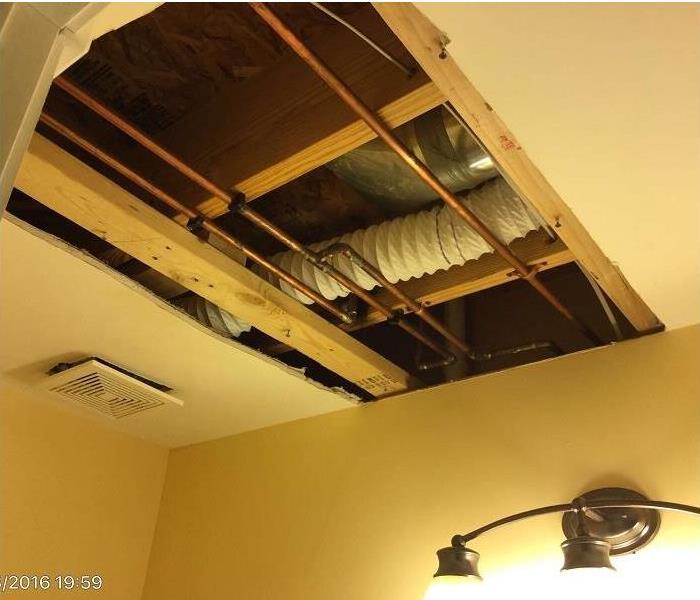 water damaged ceiling after drying and restoration in Dallas