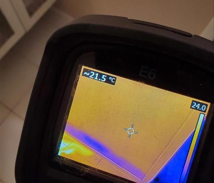 Thermal camera showing a wet bathroom wall